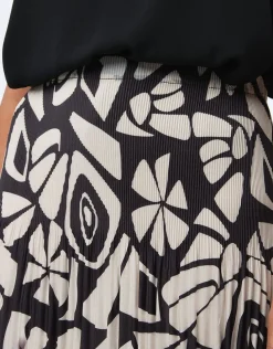 Jupe plissée beige motif