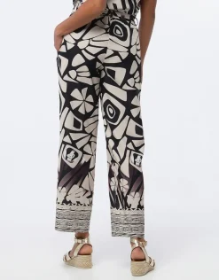 Pantalon chic beige motif