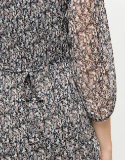 Robe plissée beige noir