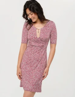 Robe rouge drapée fleurie