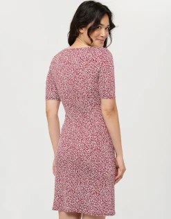 Robe rouge drapée fleurie